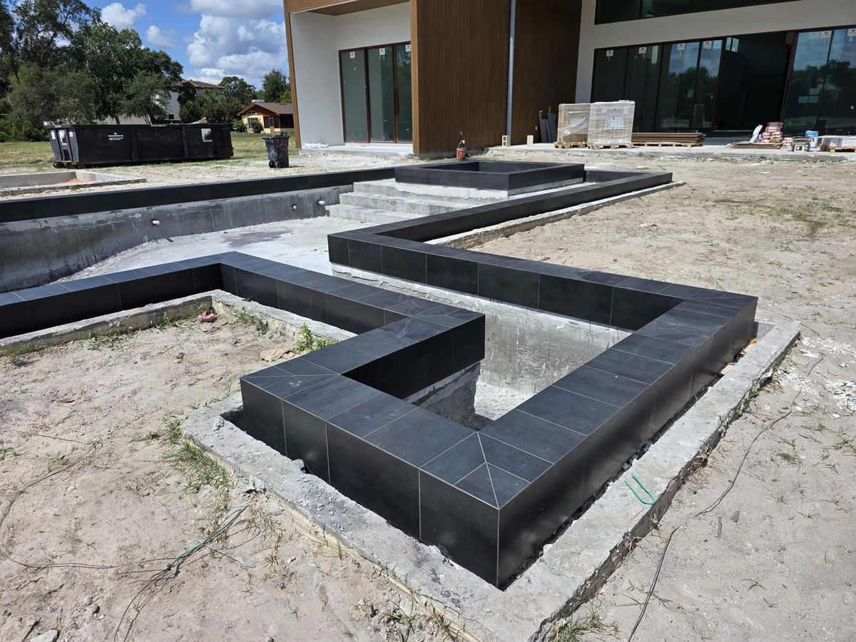 Modern dark tile coping installation