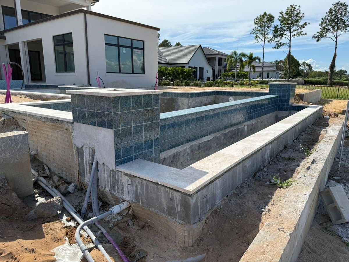 Waterline tile installation on pool in Orlando